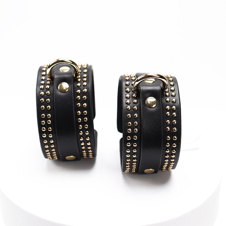 Wholesale Rivet Bondage Starter Kit in Black hand cuff
